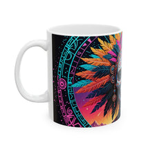 Load image into Gallery viewer, A hand holding a ceramic mug with a colorful geometric pattern design.