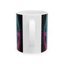 Load image into Gallery viewer, A hand holding a ceramic mug with a colorful geometric pattern design.