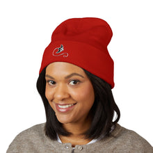 Load image into Gallery viewer, Person wearing a red beanie with a logo on a white background