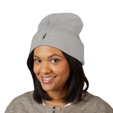 Load image into Gallery viewer, Person wearing a gray beanie with a logo on a white background