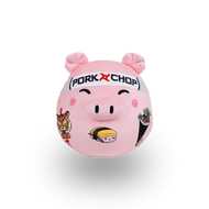 Pink plush toy resembling a pig with 'Pork Chop' headband 