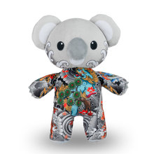 Load image into Gallery viewer, Plush toy koala with a colorful pattern on a white background
