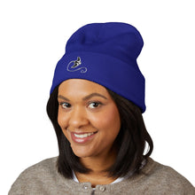 Load image into Gallery viewer, Person wearing a blue beanie with a logo on a white background
