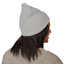 Load image into Gallery viewer, Person wearing a gray knit beanie on a white background
